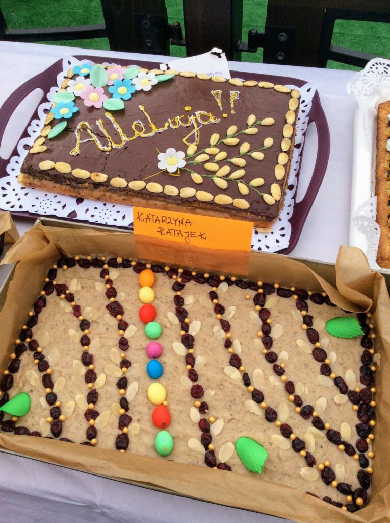 Two Polish Easter cakes decorated with colorful candies.